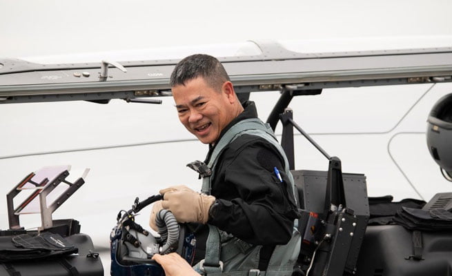 Royal-Thai-Air-Force Air Chief Marshal Chanon Mungthanya, an F-16 pilot in the Royal Thai Air Force, prepares to fly the Beechcraft T-6 Texan II during his November 2021 visit to Textron Aviation Defense in Wichita, Kansas.